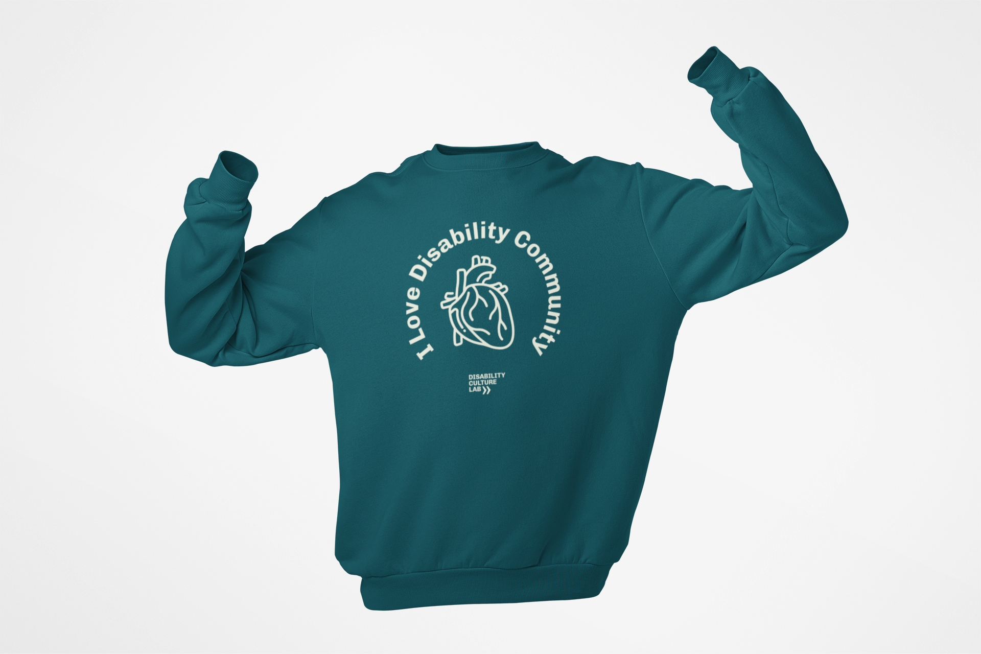 This exclusive collaboration with Disability Culture Lab presents the "I Heart Disability Community Sweatshirt," a teal garment adorned with the phrase "I Love Disability Community" alongside a heart illustration. Below, in smaller letters, it reads "Disability Lead." Set against a plain white background, this design embodies the creative spirit of Jennifer White-Johnson and the brand.